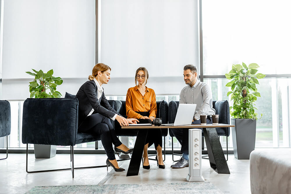 Young couple talking with financial consultant